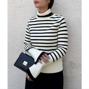 Elegant Black and White Striped Turtleneck Sweater